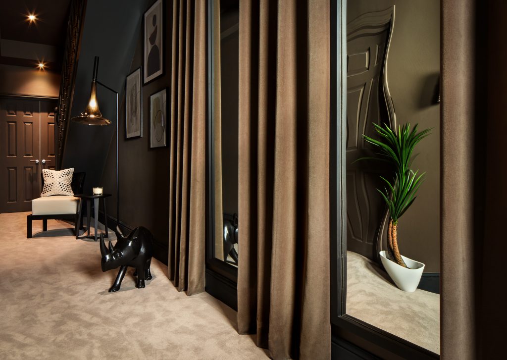 Mirror corridor leading to cinema room